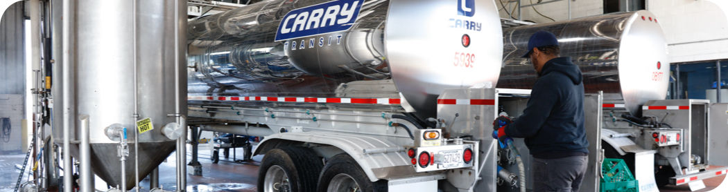 Man washing a liquid bulk truck